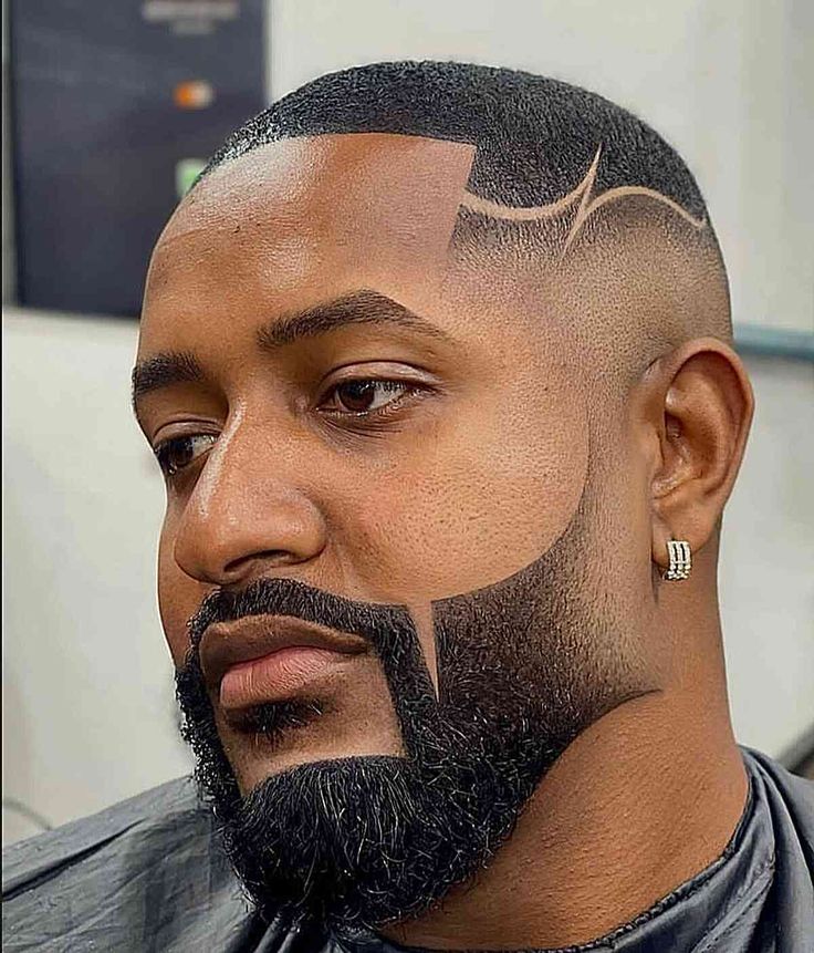 Modern bald fade haircut inspiration styled with a clean taper